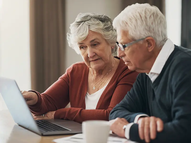 couple looking at laptop